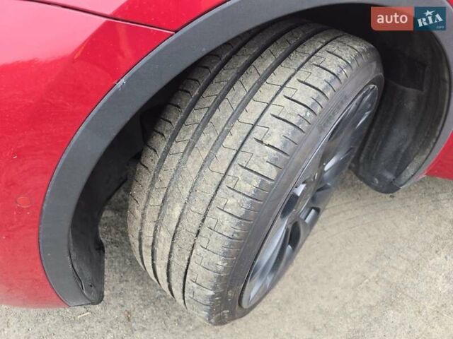 Тесла Model Y 2022 в Костополе на Automoto.ua Красный Тесла Model Y, объемом двигателя 0 л и пробегом 129 тыс. км за 17500 $, фото 10 на Automoto.ua