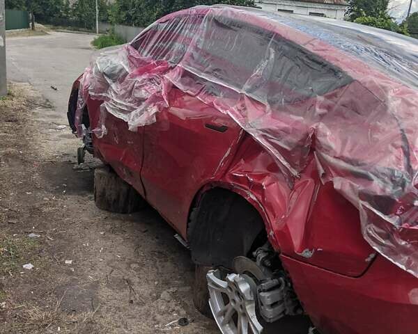 Красный Тесла Model Y, объемом двигателя 0 л и пробегом 50 тыс. км за 27500 $, фото 1 на Automoto.ua