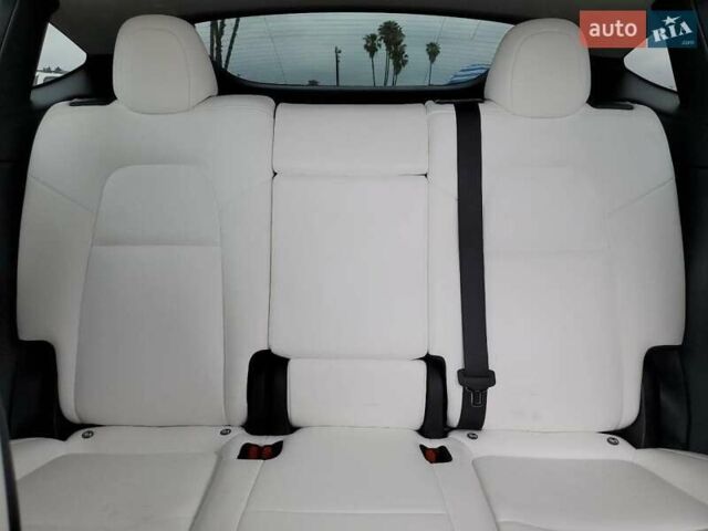 Красный Тесла Model Y, объемом двигателя 0 л и пробегом 75 тыс. км за 26500 $, фото 8 на Automoto.ua