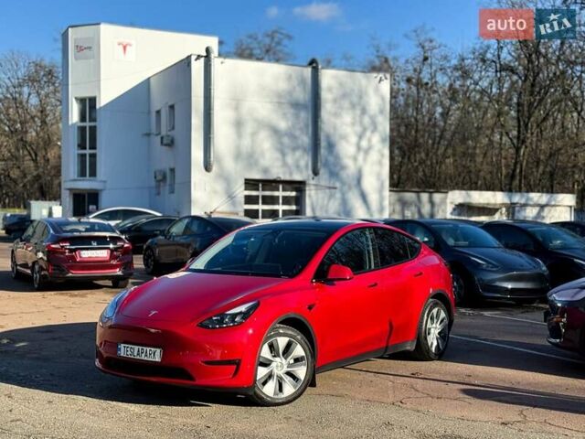 Красный Тесла Model Y, объемом двигателя 0 л и пробегом 55 тыс. км за 34999 $, фото 1 на Automoto.ua