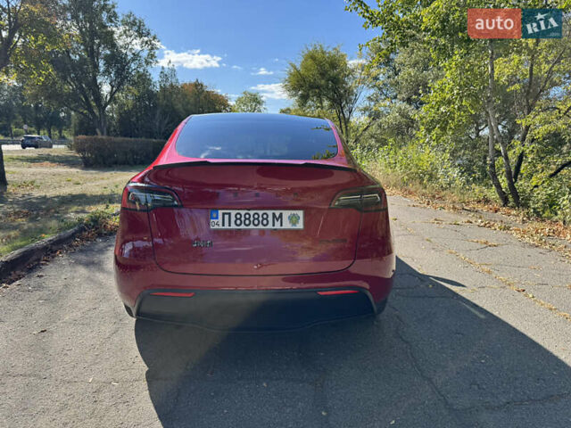 Красный Тесла Model Y, объемом двигателя 0 л и пробегом 81 тыс. км за 31500 $, фото 2 на Automoto.ua