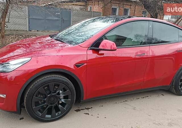 Красный Тесла Model Y, объемом двигателя 0 л и пробегом 51 тыс. км за 27500 $, фото 1 на Automoto.ua