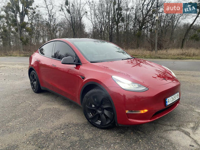 Красный Тесла Model Y, объемом двигателя 0 л и пробегом 70 тыс. км за 27300 $, фото 2 на Automoto.ua