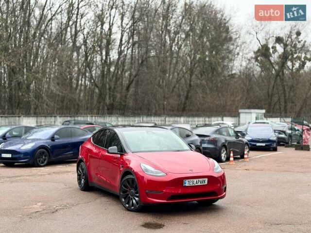 Червоний Тесла Model Y, об'ємом двигуна 0 л та пробігом 25 тис. км за 30999 $, фото 1 на Automoto.ua