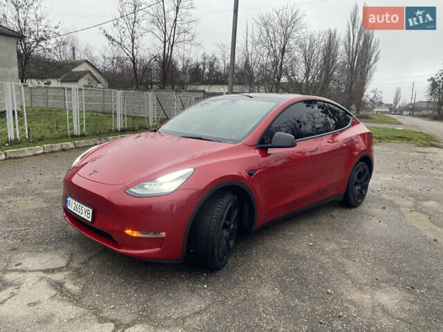 Красный Тесла Model Y, объемом двигателя 0 л и пробегом 70 тыс. км за 27300 $, фото 1 на Automoto.ua