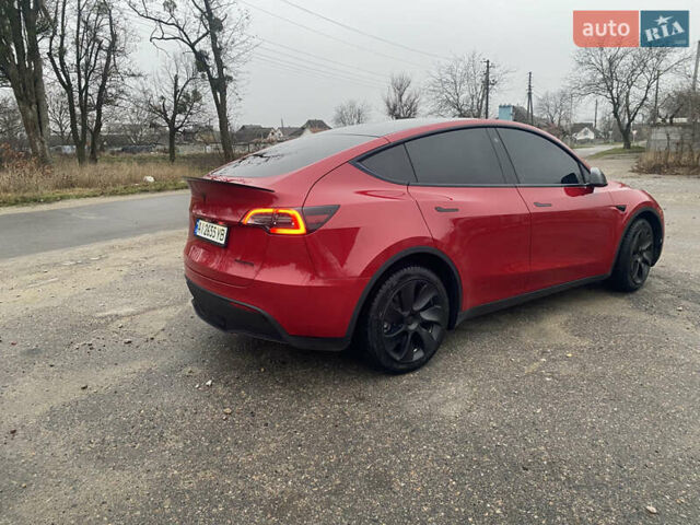 Красный Тесла Model Y, объемом двигателя 0 л и пробегом 70 тыс. км за 27300 $, фото 16 на Automoto.ua