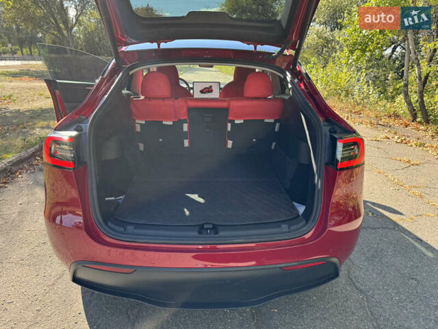Красный Тесла Model Y, объемом двигателя 0 л и пробегом 81 тыс. км за 31500 $, фото 3 на Automoto.ua