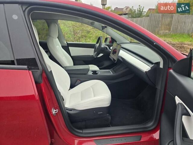 Тесла Model Y 2022 в Костополе на Automoto.ua Красный Тесла Model Y, объемом двигателя 0 л и пробегом 129 тыс. км за 17500 $, фото 38 на Automoto.ua