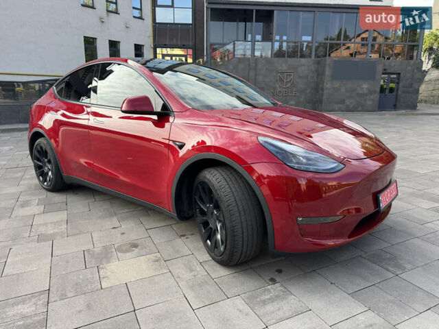 Тесла Model Y 2023 у Луцьку на Automoto.ua Червоний Тесла Model Y, об'ємом двигуна 0 л та пробігом 33 тис. км за 26000 $, фото 1 на Automoto.ua