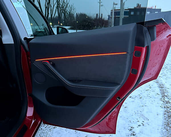 Красный Тесла Model Y, объемом двигателя 0 л и пробегом 23 тыс. км за 34700 $, фото 21 на Automoto.ua