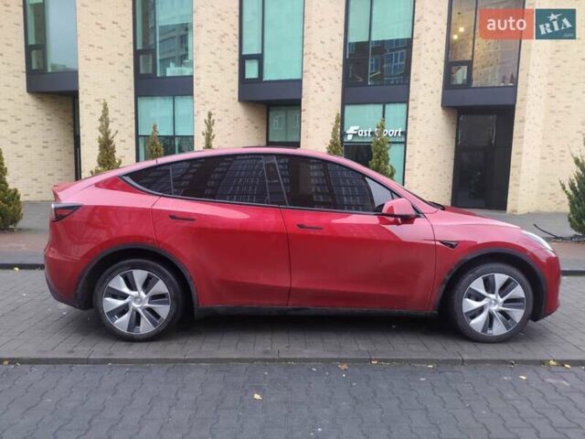 Червоний Тесла Model Y, об'ємом двигуна 0 л та пробігом 90 тис. км за 26900 $, фото 1 на Automoto.ua