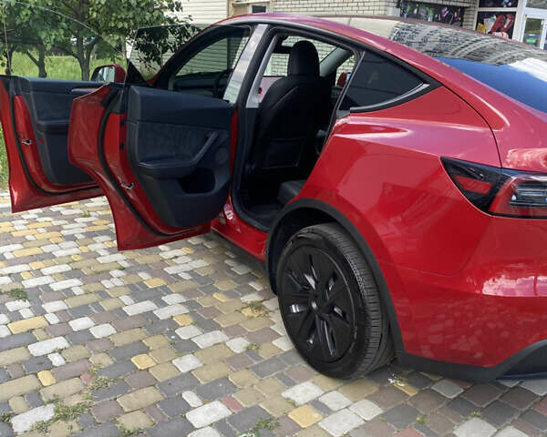 Тесла Model Y 2023 в Киеве на Automoto.ua Красный Тесла Model Y, объемом двигателя 0 л и пробегом 27 тыс. км за 28800 $, фото 29 на Automoto.ua