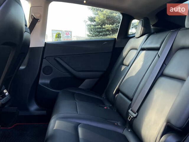 Красный Тесла Model Y, объемом двигателя 0 л и пробегом 26 тыс. км за 29800 $, фото 19 на Automoto.ua