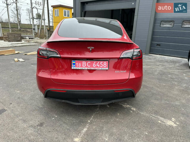 Красный Тесла Model Y, объемом двигателя 0 л и пробегом 54 тыс. км за 27000 $, фото 1 на Automoto.ua