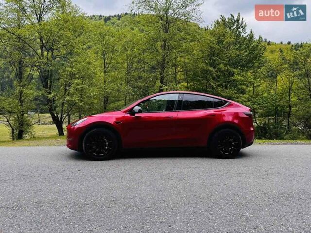 Красный Тесла Model Y, объемом двигателя 0 л и пробегом 53 тыс. км за 24800 $, фото 1 на Automoto.ua