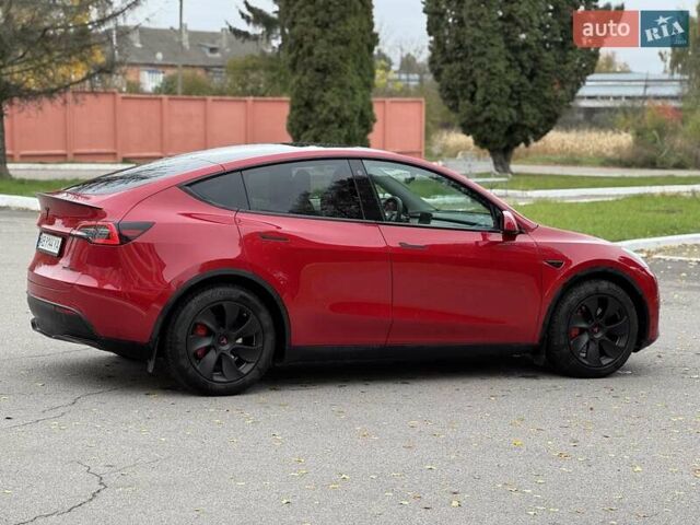 Красный Тесла Model Y, объемом двигателя 0 л и пробегом 84 тыс. км за 25800 $, фото 3 на Automoto.ua