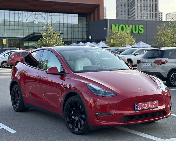 Червоний Тесла Model Y, об'ємом двигуна 0 л та пробігом 50 тис. км за 25300 $, фото 1 на Automoto.ua