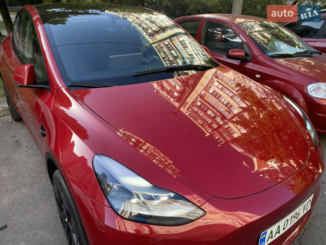 Красный Тесла Model Y, объемом двигателя 0 л и пробегом 26 тыс. км за 29999 $, фото 3 на Automoto.ua