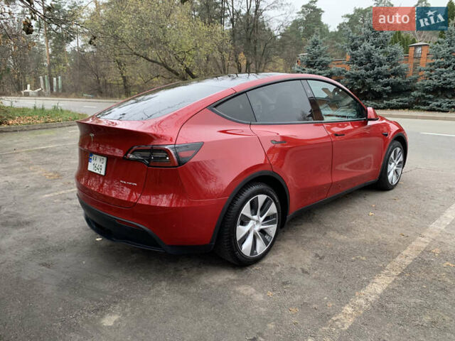 Червоний Тесла Model Y, об'ємом двигуна 0 л та пробігом 21 тис. км за 26900 $, фото 2 на Automoto.ua