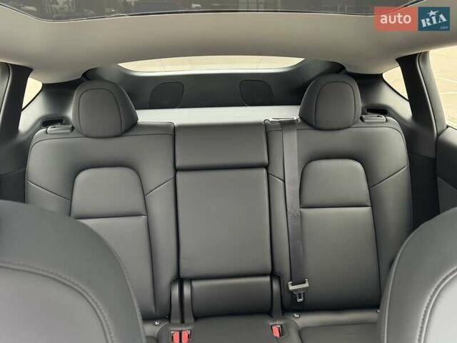 Красный Тесла Model Y, объемом двигателя 0 л и пробегом 3 тыс. км за 38700 $, фото 38 на Automoto.ua