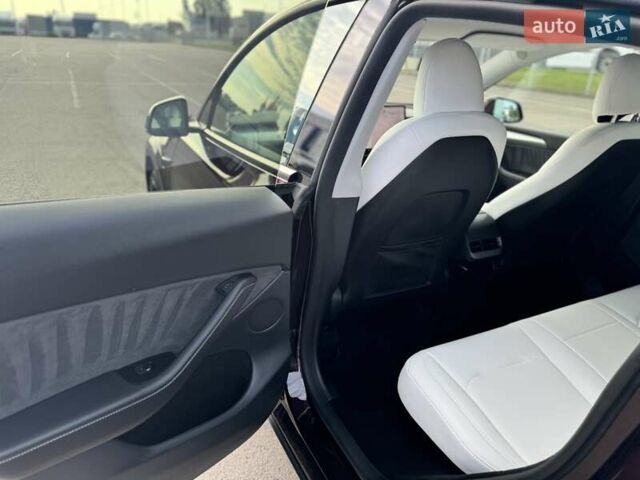 Червоний Тесла Model Y, об'ємом двигуна 0 л та пробігом 42 тис. км за 34990 $, фото 24 на Automoto.ua