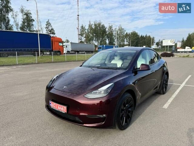 Червоний Тесла Model Y, об'ємом двигуна 0 л та пробігом 42 тис. км за 34990 $, фото 1 на Automoto.ua