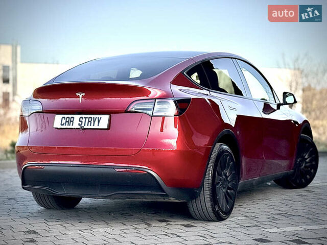 Красный Тесла Model Y, объемом двигателя 0 л и пробегом 8 тыс. км за 29999 $, фото 2 на Automoto.ua