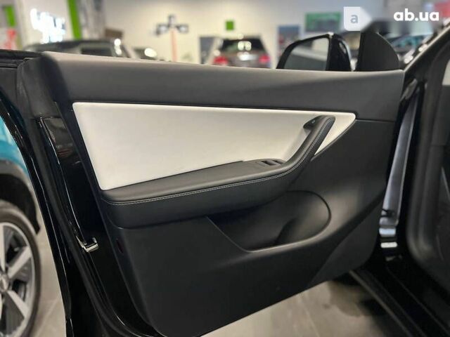 Тесла Model Y, объемом двигателя 0 л и пробегом 4 тыс. км за 64900 $, фото 22 на Automoto.ua