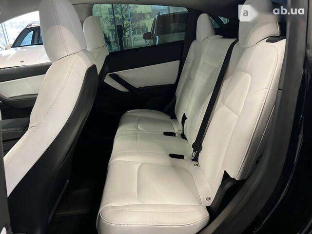 Тесла Model Y, объемом двигателя 0 л и пробегом 4 тыс. км за 64900 $, фото 19 на Automoto.ua