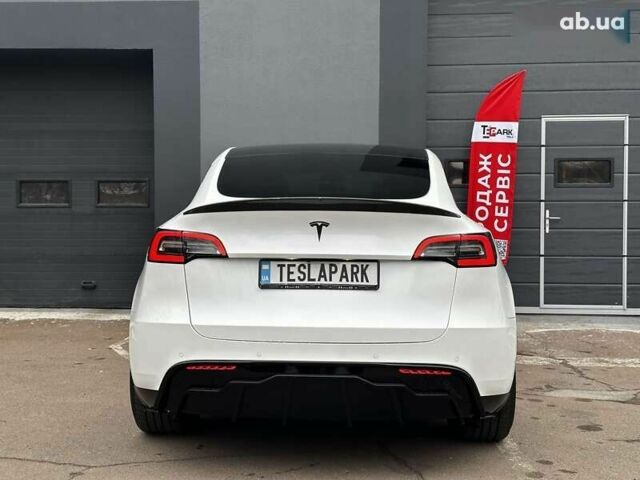 Тесла Model Y, объемом двигателя 4.25 л и пробегом 77 тыс. км за 28999 $, фото 7 на Automoto.ua