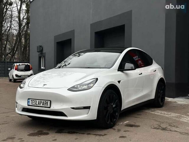 Тесла Model Y, объемом двигателя 4.25 л и пробегом 77 тыс. км за 28999 $, фото 2 на Automoto.ua