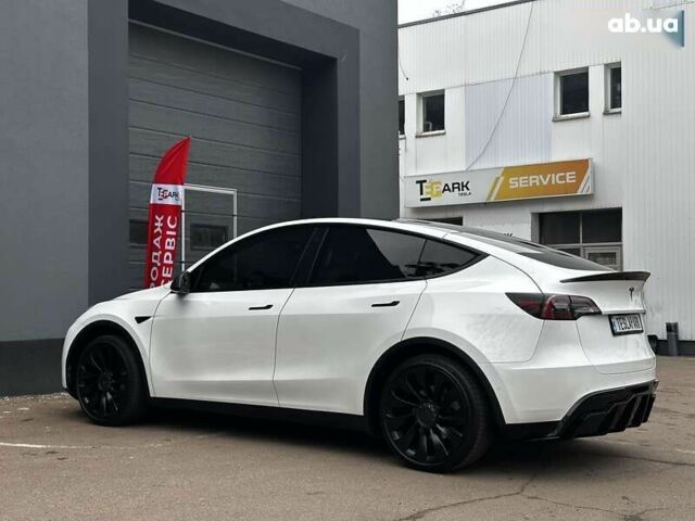Тесла Model Y, объемом двигателя 4.25 л и пробегом 77 тыс. км за 28999 $, фото 6 на Automoto.ua
