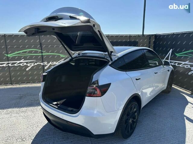 Тесла Model Y, объемом двигателя 0 л и пробегом 94 тыс. км за 21999 $, фото 28 на Automoto.ua