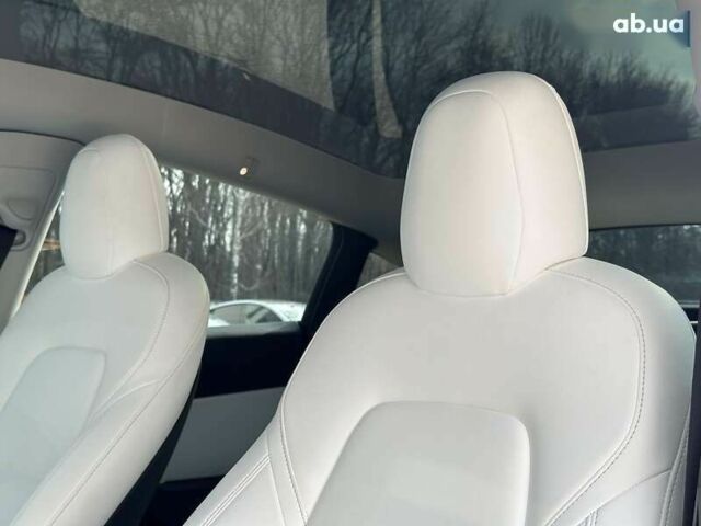Тесла Model Y, объемом двигателя 0 л и пробегом 66 тыс. км за 28999 $, фото 12 на Automoto.ua