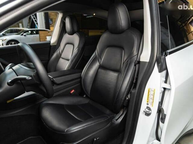 Тесла Model Y, объемом двигателя 0 л и пробегом 123 тыс. км за 22500 $, фото 14 на Automoto.ua