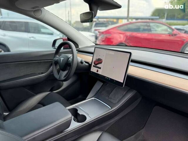 Тесла Model Y, объемом двигателя 0 л и пробегом 125 тыс. км за 17500 $, фото 12 на Automoto.ua