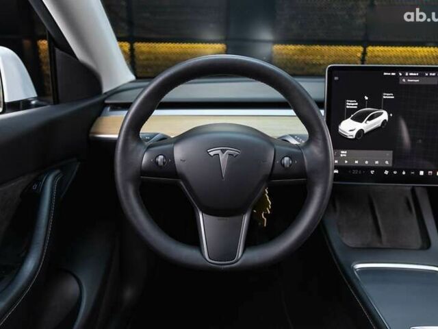 Тесла Model Y, объемом двигателя 0 л и пробегом 123 тыс. км за 22500 $, фото 19 на Automoto.ua