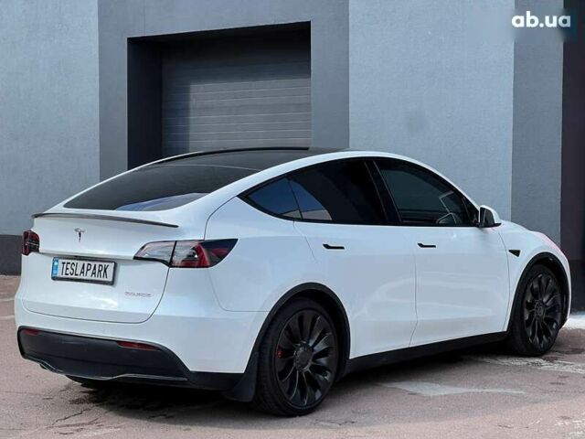 Тесла Model Y, объемом двигателя 0 л и пробегом 28 тыс. км за 29999 $, фото 9 на Automoto.ua