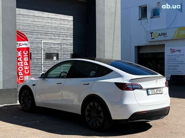 Тесла Model Y, объемом двигателя 0 л и пробегом 59 тыс. км за 31999 $, фото 7 на Automoto.ua