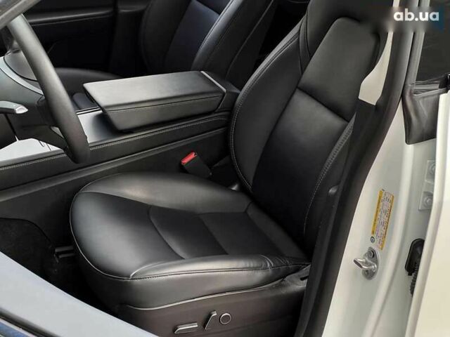 Тесла Model Y, объемом двигателя 0 л и пробегом 28 тыс. км за 29999 $, фото 12 на Automoto.ua