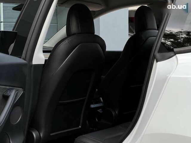 Тесла Model Y, объемом двигателя 0 л и пробегом 28 тыс. км за 29999 $, фото 16 на Automoto.ua