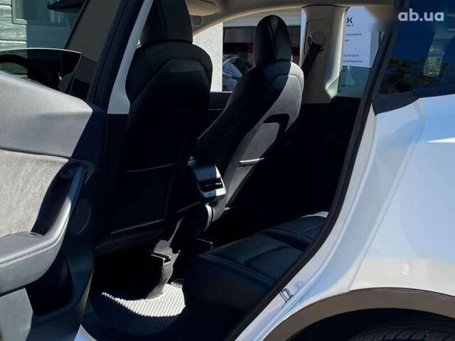Тесла Model Y, объемом двигателя 0 л и пробегом 59 тыс. км за 31999 $, фото 14 на Automoto.ua