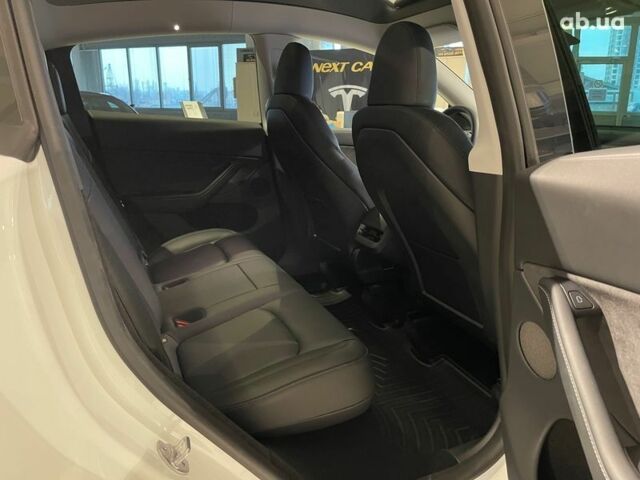 Тесла Model Y, объемом двигателя 0 л и пробегом 15 тыс. км за 59800 $, фото 12 на Automoto.ua
