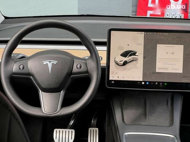 Тесла Model Y, объемом двигателя 0 л и пробегом 28 тыс. км за 29999 $, фото 18 на Automoto.ua