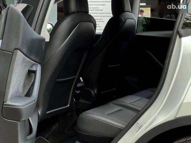 Тесла Model Y, объемом двигателя 0 л и пробегом 28 тыс. км за 29999 $, фото 15 на Automoto.ua