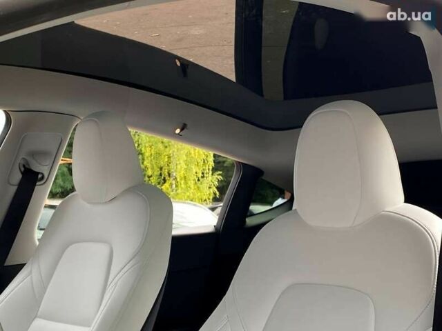 Тесла Model Y, объемом двигателя 0 л и пробегом 23 тыс. км за 31999 $, фото 13 на Automoto.ua