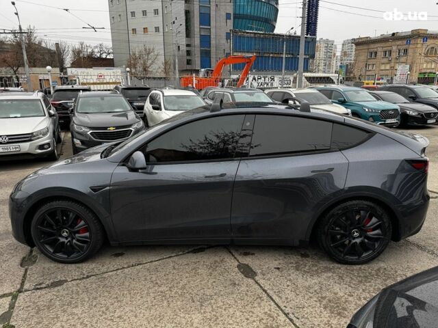 Серый Тесла Model Y, объемом двигателя 0 л и пробегом 98 тыс. км за 29490 $, фото 2 на Automoto.ua