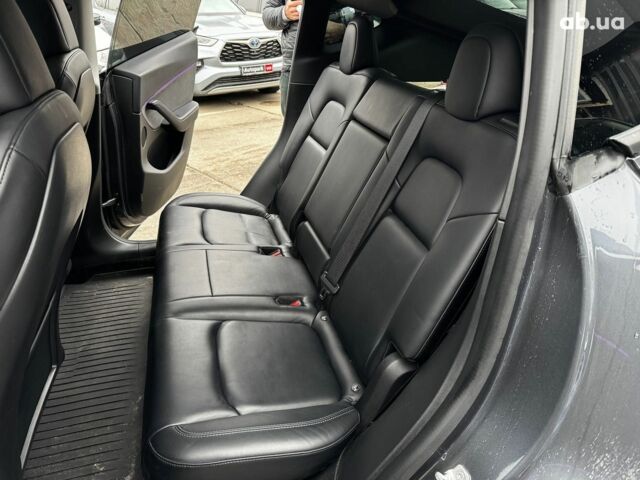 Серый Тесла Model Y, объемом двигателя 0 л и пробегом 98 тыс. км за 29490 $, фото 20 на Automoto.ua