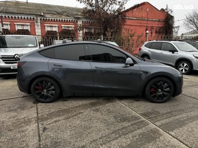 Серый Тесла Model Y, объемом двигателя 0 л и пробегом 98 тыс. км за 29490 $, фото 6 на Automoto.ua