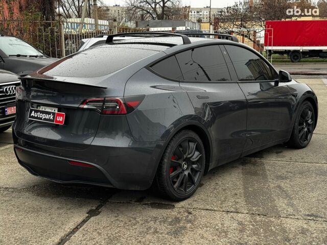 Серый Тесла Model Y, объемом двигателя 0 л и пробегом 98 тыс. км за 29490 $, фото 5 на Automoto.ua